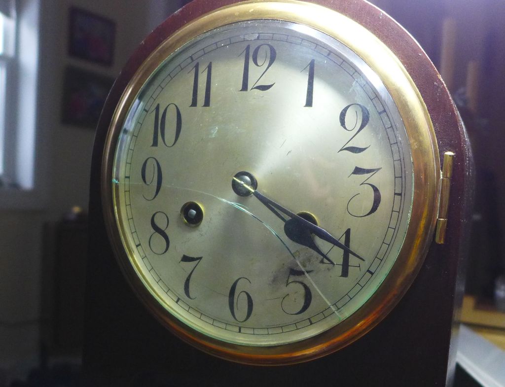 Cracked dial glass on a Junghans mantel clock